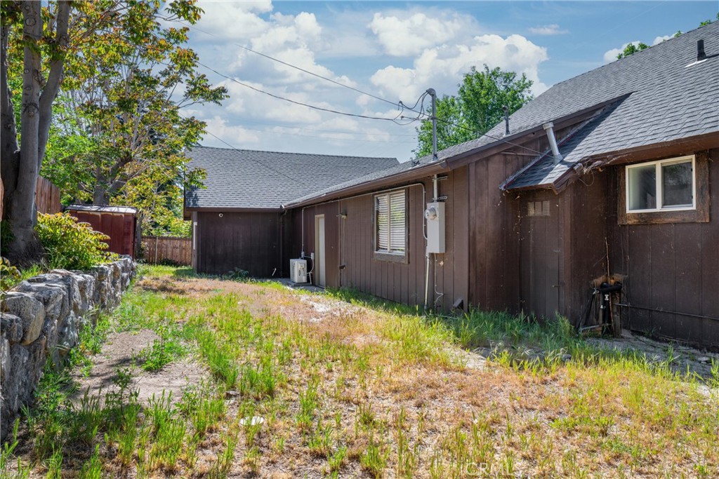 4225 Alcot Trail Frazier Park, CA 93225 - Photo 19 of 31 a backyard of a house with yard and outdoor seating