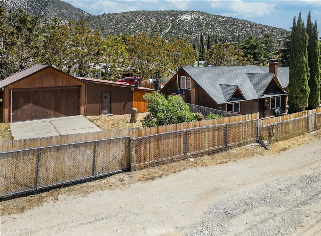 4225 Alcot Trail Frazier Park, CA 93225 - Photo 25 of 31 a house with trees in the background