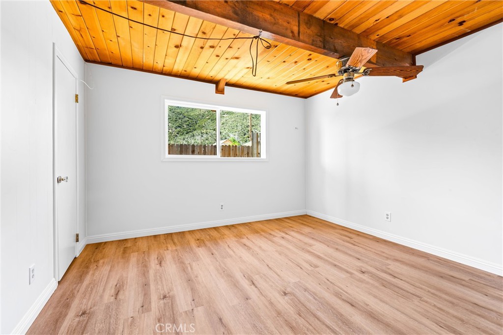 4225 Alcot Trail Frazier Park, CA 93225 - Photo 9 of 31 a view of a room with wooden floor and a window