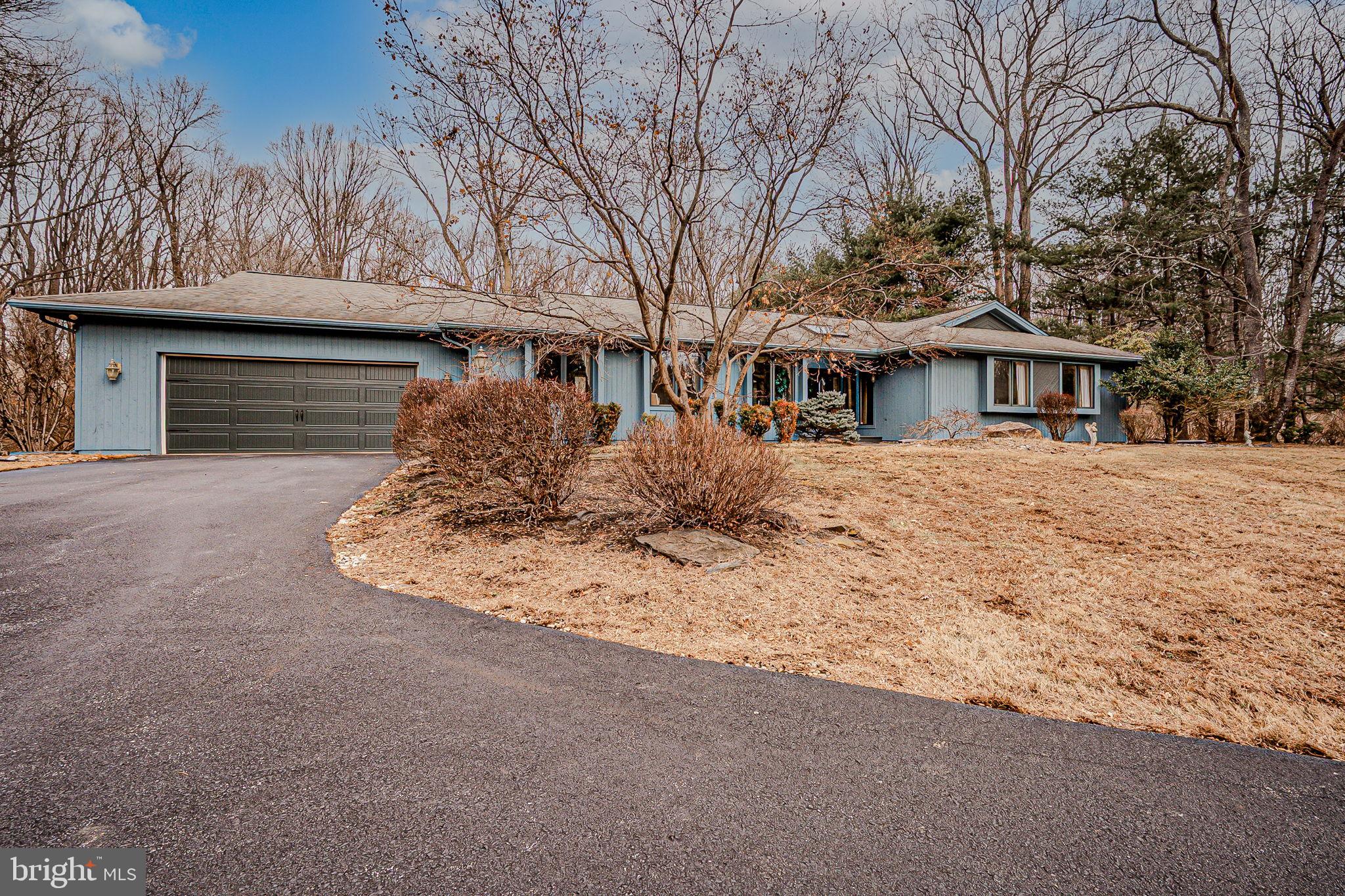 53 Bullock Road Chadds Ford, PA 19317 - Photo 2 of 65 a front view of a house with a yard covered with snow