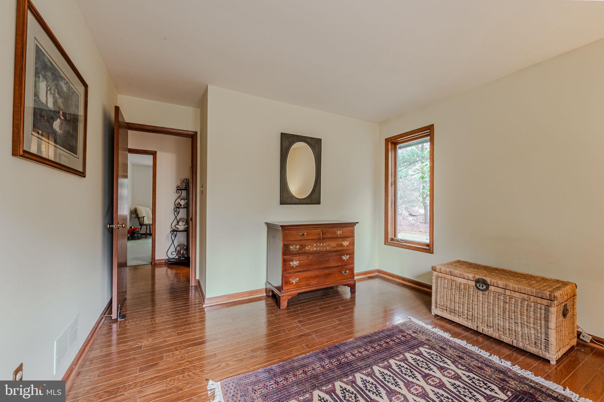 53 Bullock Road Chadds Ford, PA 19317 - Photo 32 of 65 a room with furniture and a window