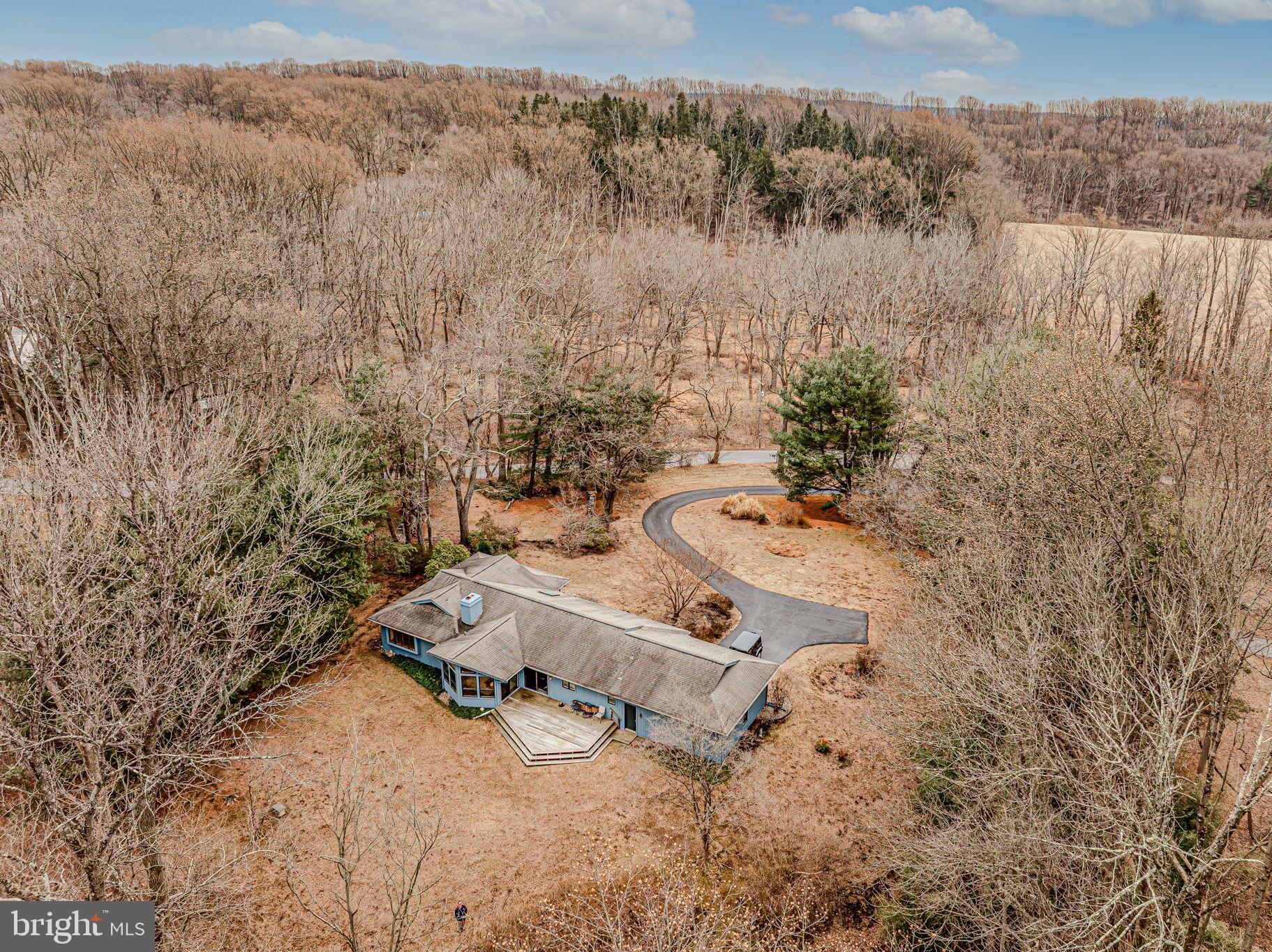 53 Bullock Road Chadds Ford, PA 19317 - Photo 43 of 65 a bathroom with a toilet and a sink