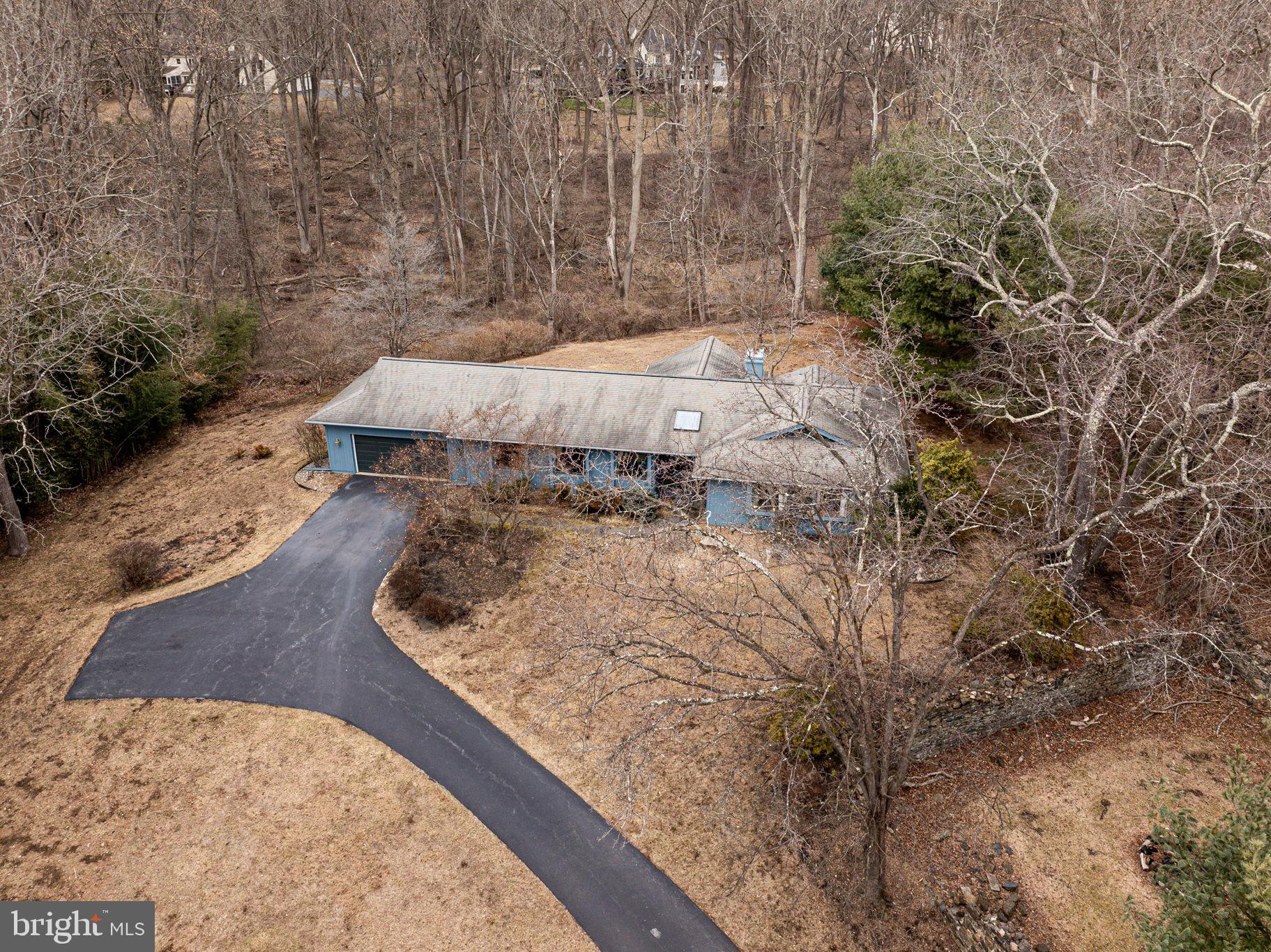 53 Bullock Road Chadds Ford, PA 19317 - Photo 53 of 65 a view of a backyard with wooden fence