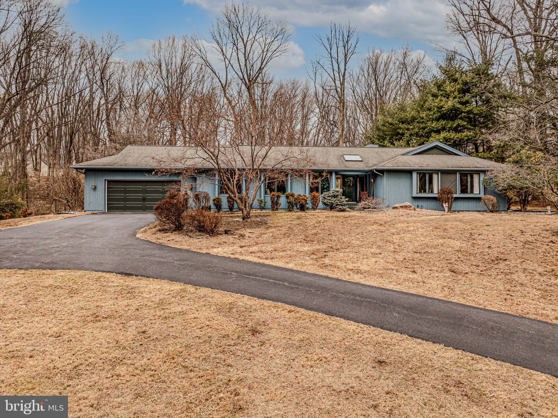 53 Bullock Road Chadds Ford, PA 19317 - Photo 57 of 65 a front view of a house with a yard