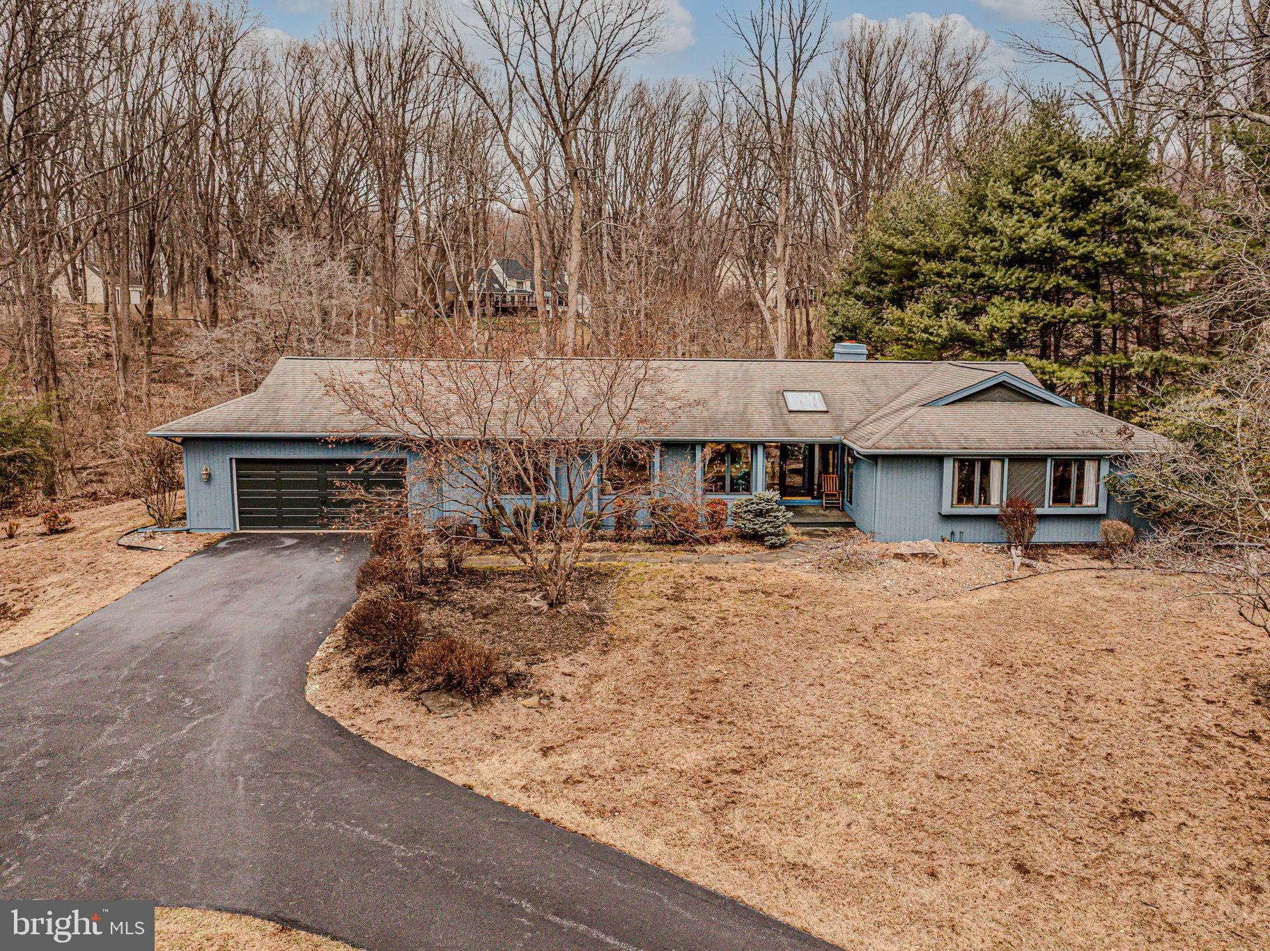 53 Bullock Road Chadds Ford, PA 19317 - Photo 58 of 65 front view of a house with a yard