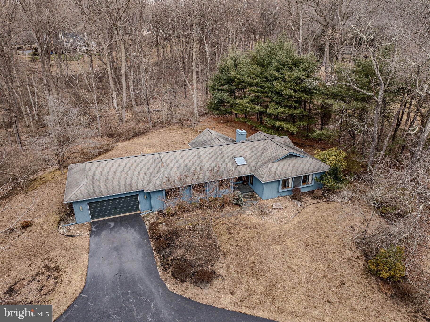 53 Bullock Road Chadds Ford, PA 19317 - Photo 60 of 65 a view of a yard with an outdoor space