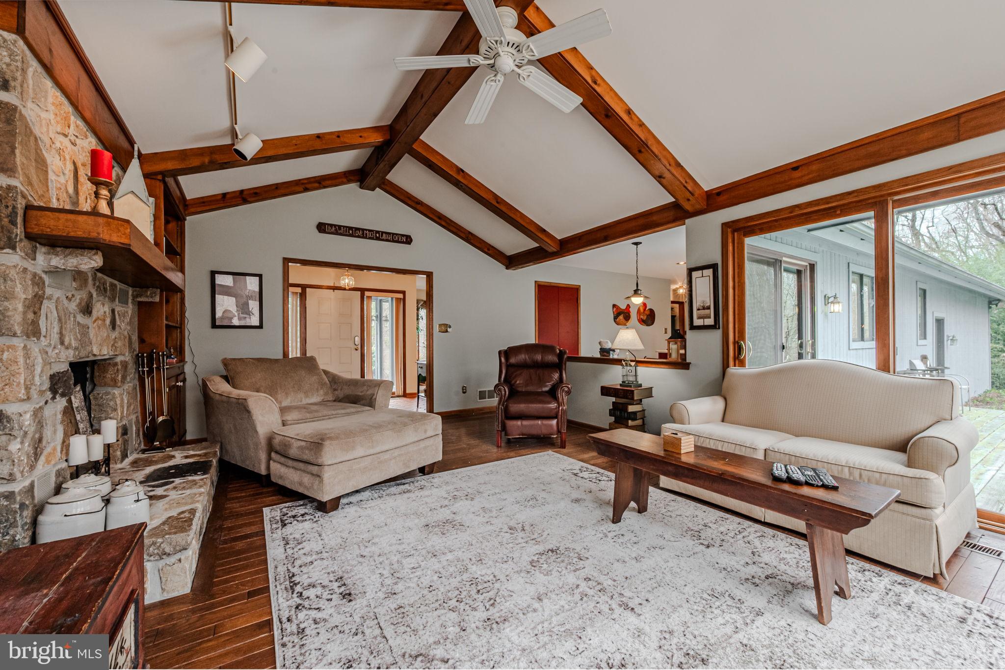 53 Bullock Road Chadds Ford, PA 19317 - Photo 9 of 65 a living room with furniture and a fireplace