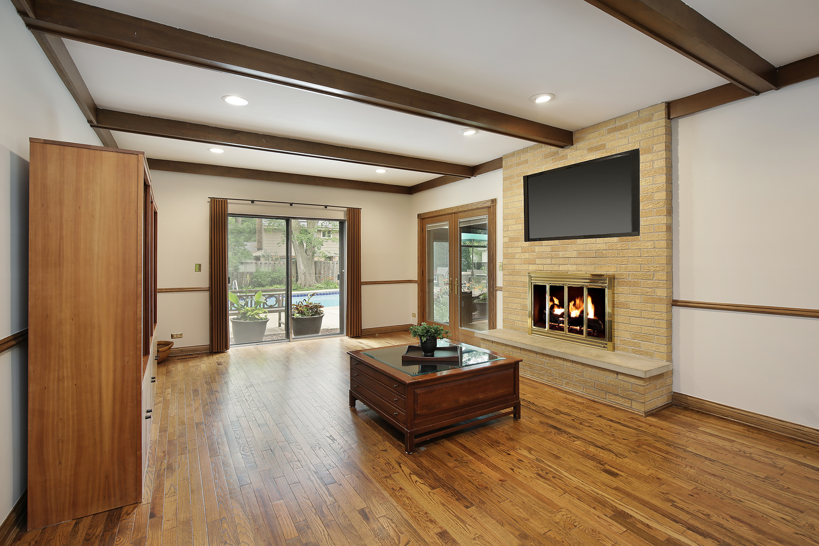 1945 Smith Road Northbrook, IL 60062 - Photo 8 of 29 a living room with furniture and a fireplace