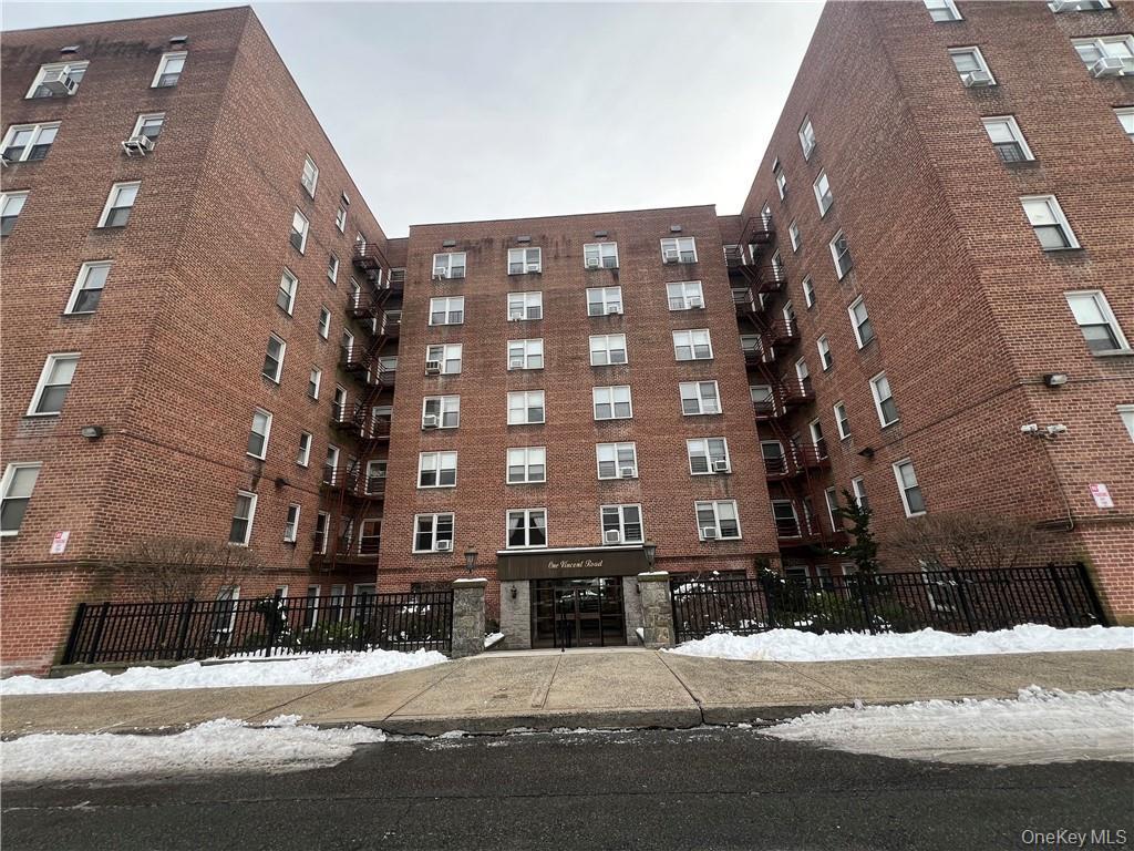 a view of a building and a street