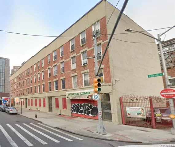 a view of a building and a street