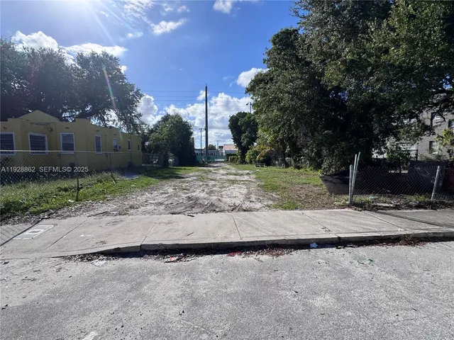 a view of a backyard of a house