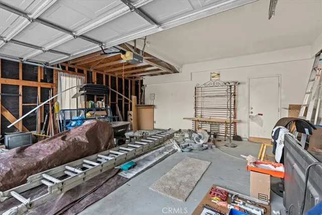 an aerial view of houses with an outdoor space