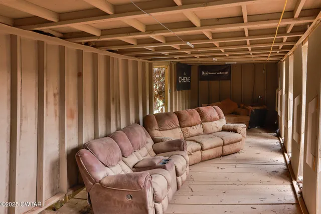 a view of a house with a tree