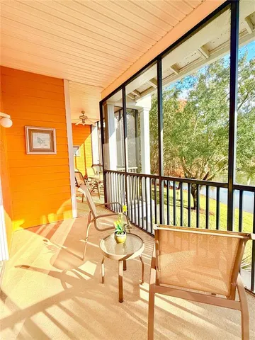 a spacious bathroom with a double vanity sink a toilet and a mirror