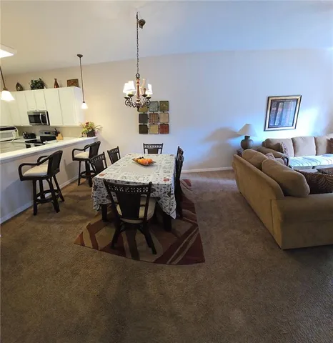 a view of a house with a bath tub and a yard