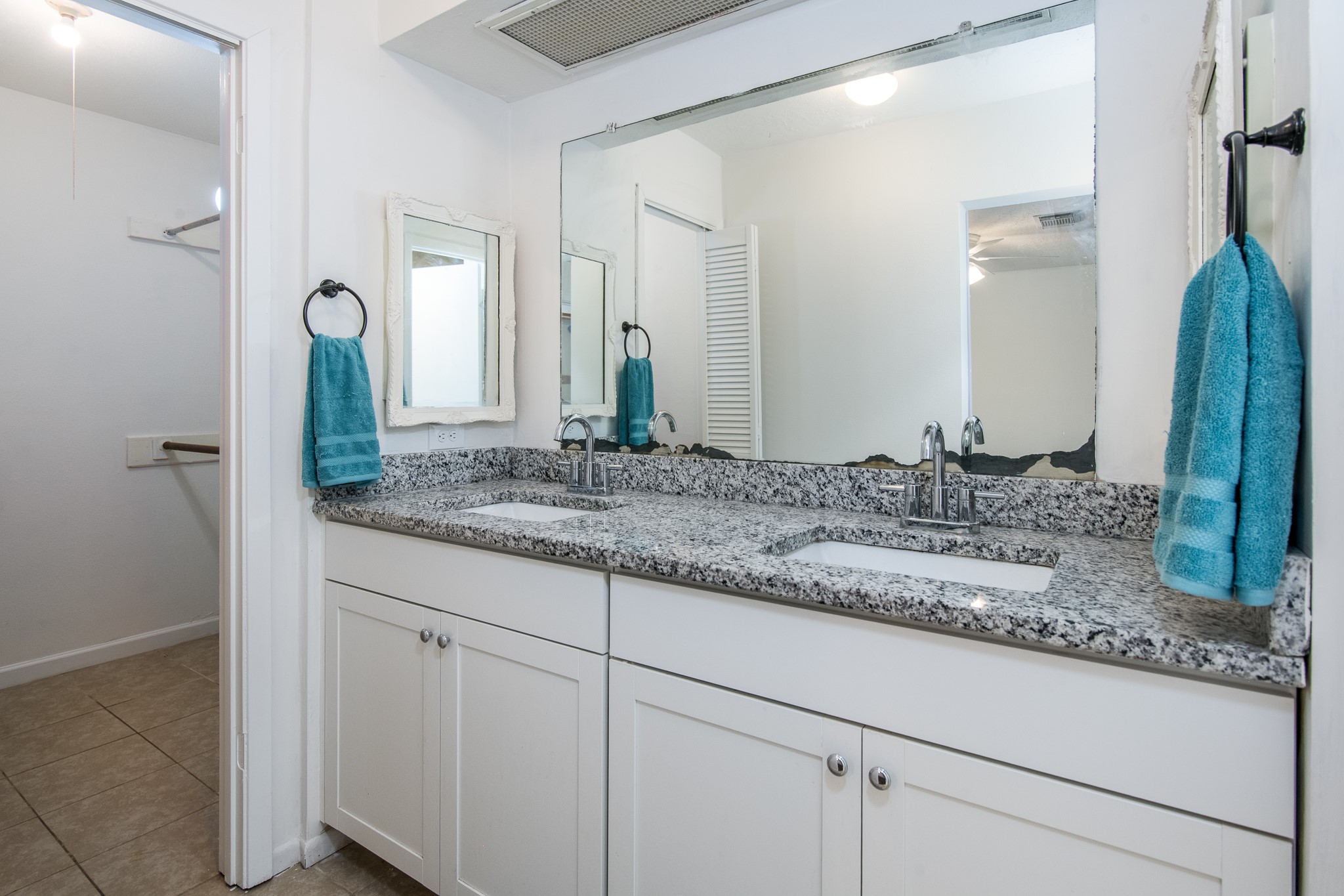 9707 Whitepost Lane Houston, TX 77086 - Photo 14 of 30 a bathroom with a sink and a mirror