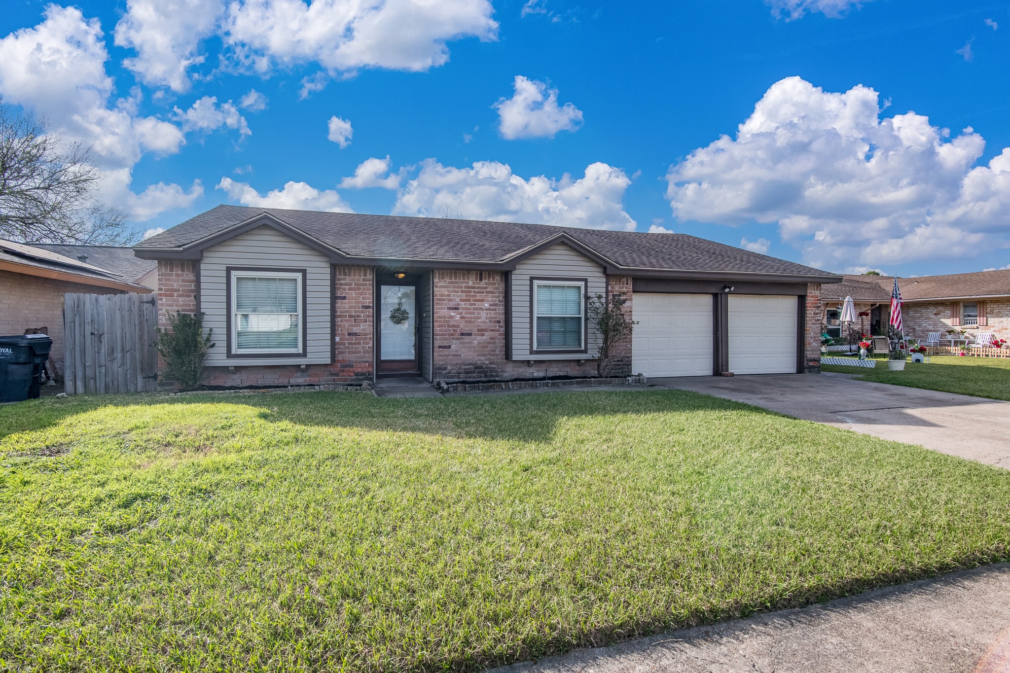 9707 Whitepost Lane Houston, TX 77086 - Photo 18 of 30 a front view of a house with a garden
