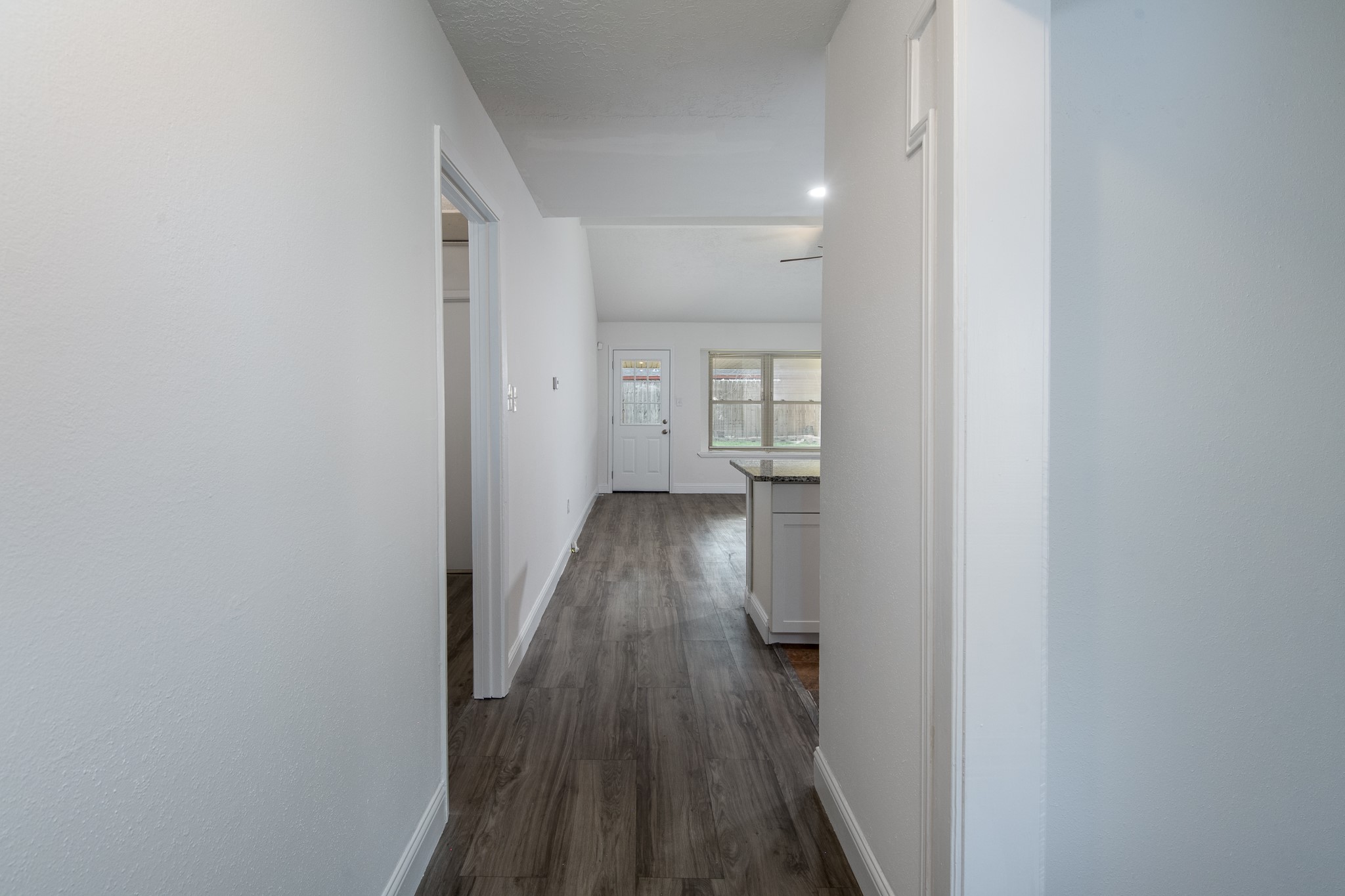 9707 Whitepost Lane Houston, TX 77086 - Photo 25 of 30 a view of wooden floor in a bathroom