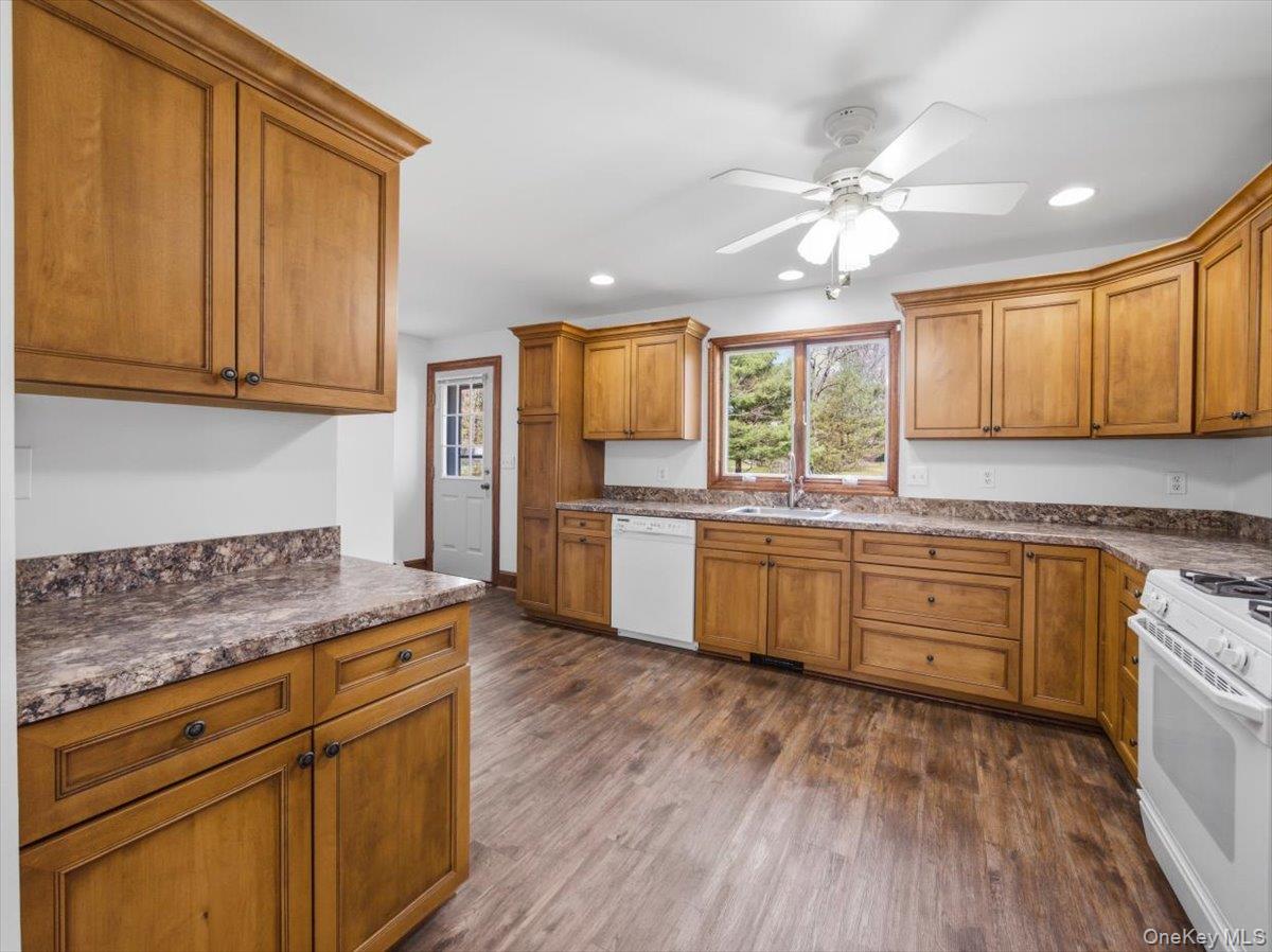 311 Gate Hill Coop Road Stony Point, NY 10980 - Photo 14 of 42 The kitchen features extensive wooden cabinetry, a white ceiling fan, and recessed lighting