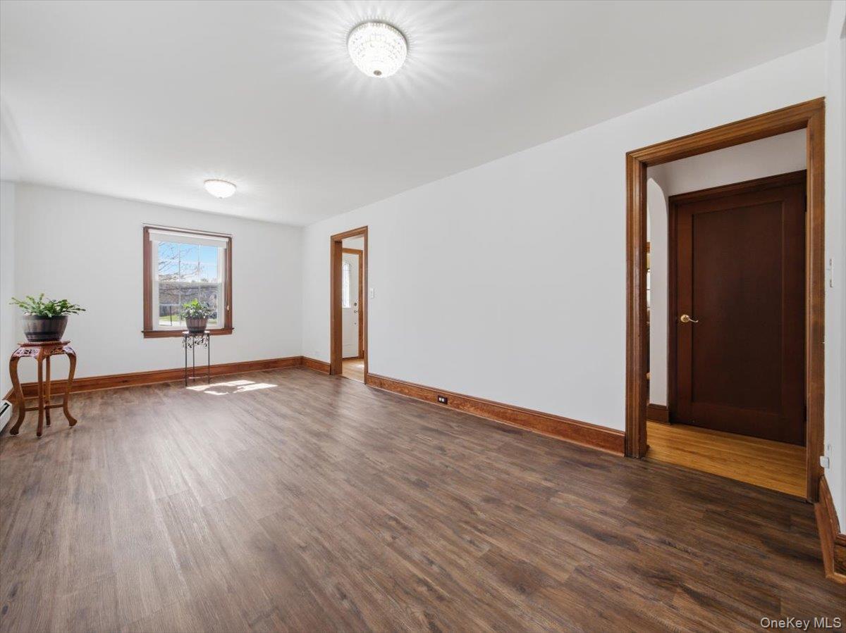 311 Gate Hill Coop Road Stony Point, NY 10980 - Photo 19 of 42 This room features wood-look flooring, white walls, and dark wood trim
