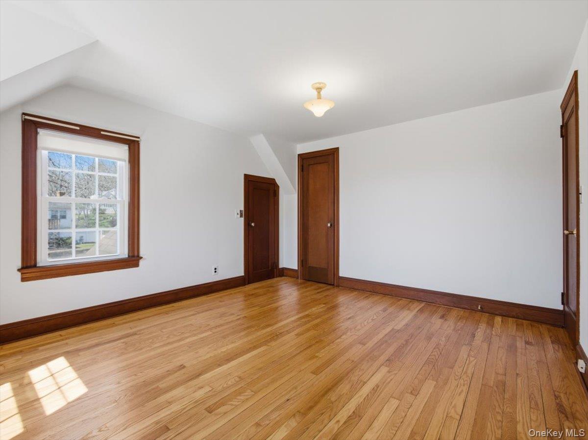 311 Gate Hill Coop Road Stony Point, NY 10980 - Photo 28 of 42 This room features hardwood floors, white walls, and a window with a view of the surrounding neighborhood