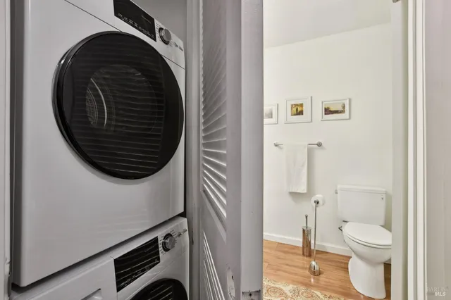 a close view of a utility room with washer and dryer