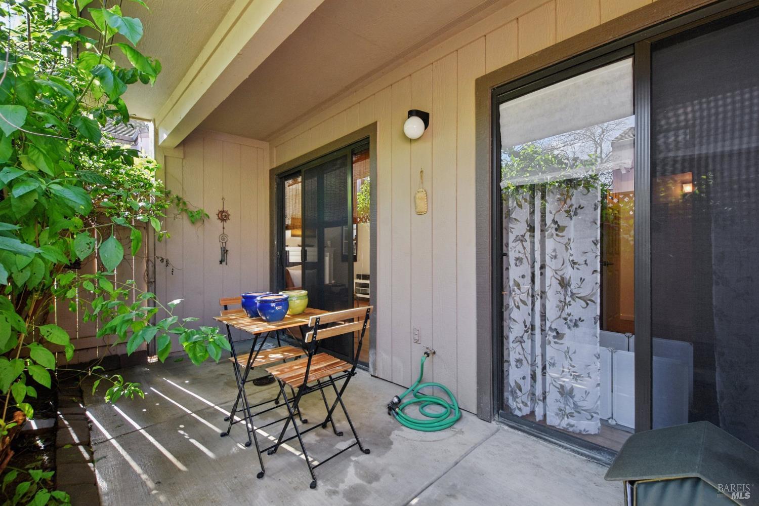 1801 Marshall Road, Unit 401 Vacaville, CA 95687 - Photo 17 of 20 a view of a porch with furniture and next to a window