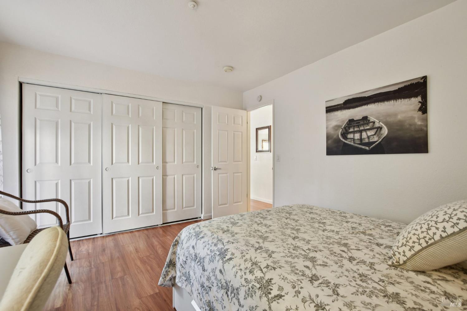1801 Marshall Road, Unit 401 Vacaville, CA 95687 - Photo 10 of 20 a bedroom with a bed and a painting on the wall