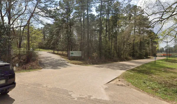 a view of road with trees