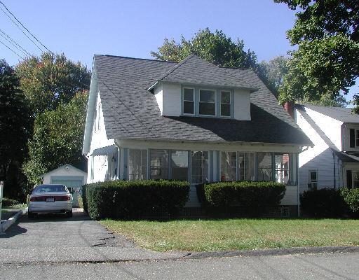 22 Fowler Street Stamford, CT 06905 - Photo 1 of 1 a front view of a house with a garden