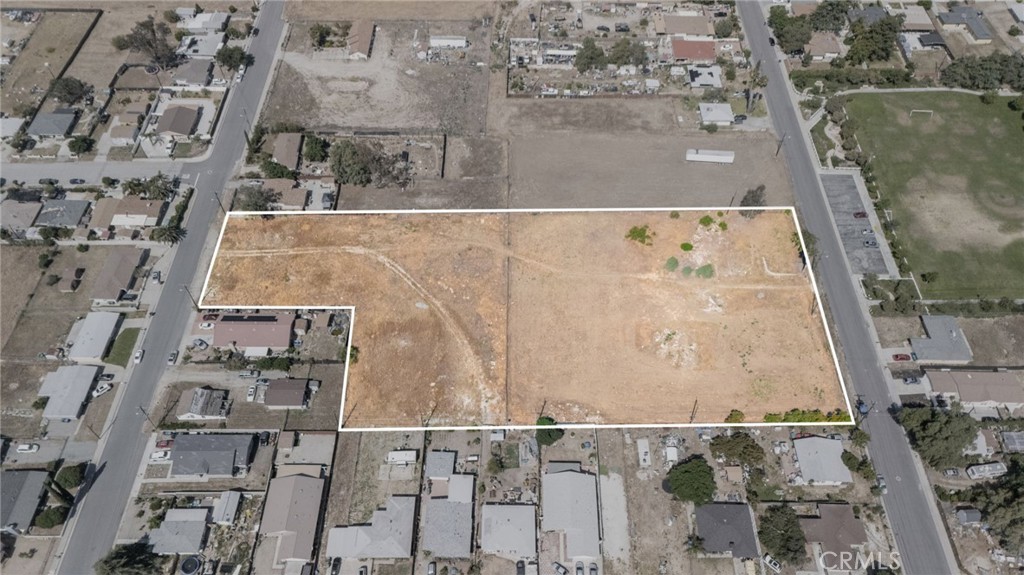 1130 East George Street Banning, CA 92220 - Photo 2 of 15 an aerial view of residential houses with outdoor space