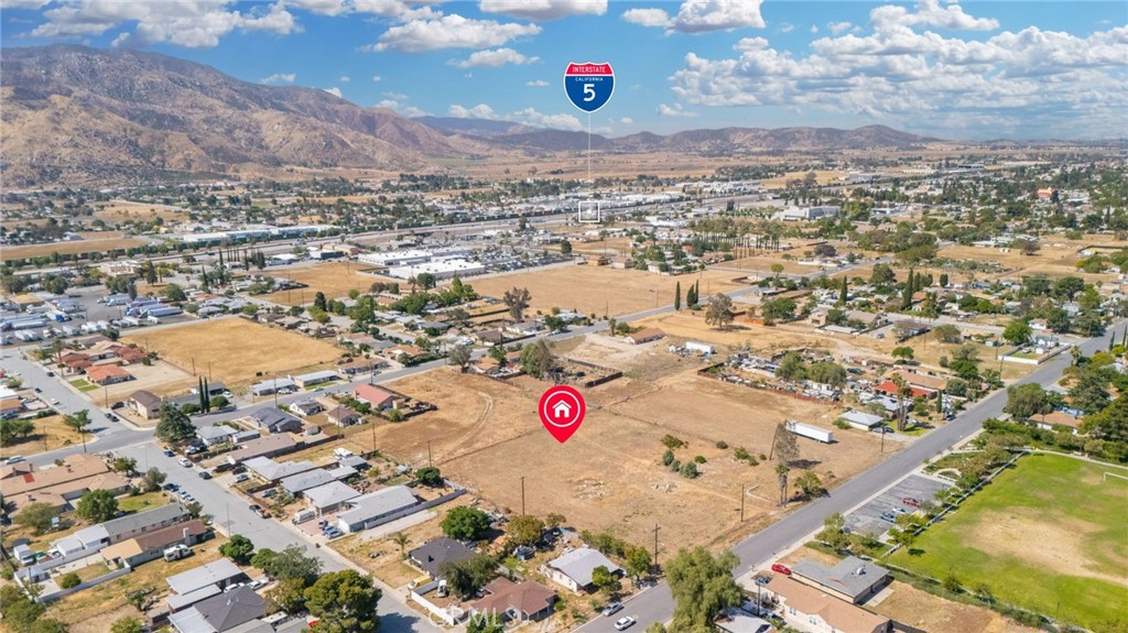 1130 East George Street Banning, CA 92220 - Photo 6 of 15 an aerial view of residential building and parking space