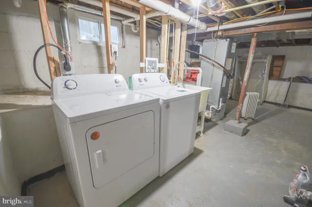 a view of empty room with wooden walls