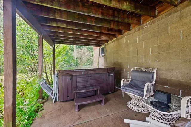 a view of a yard with a tree