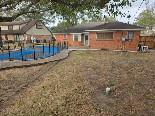 a front view of a house with yard