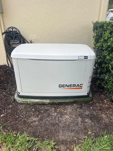 a view of a fountain in front of a house