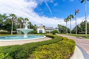 a view of a swimming pool with a garden