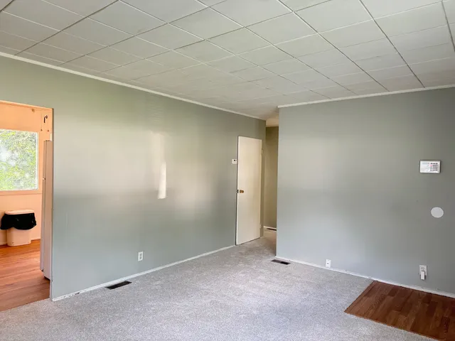 an empty room with windows