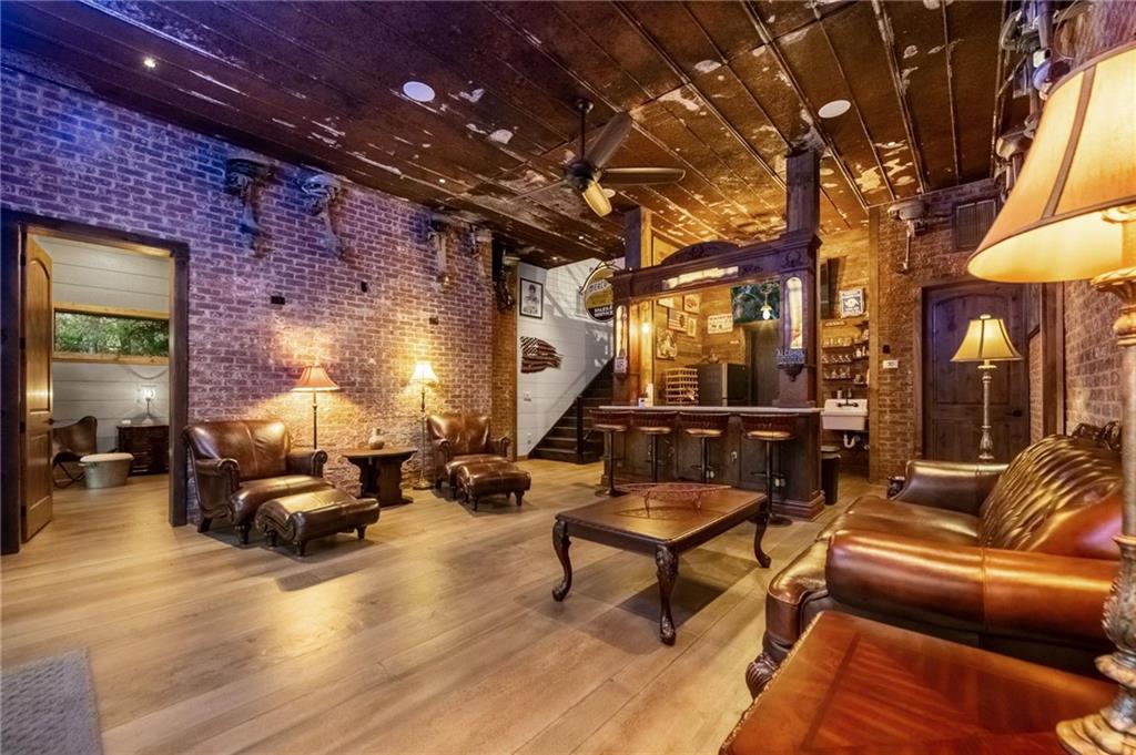 66 Rome Point Blue Ridge, GA 30513 - Photo 24 of 59 a outdoor living space with patio furniture and a chandelier