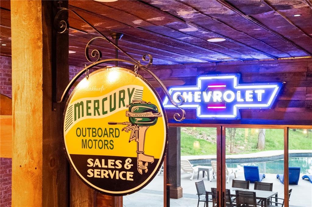 66 Rome Point Blue Ridge, GA 30513 - Photo 31 of 59 a sign on the wall of a building