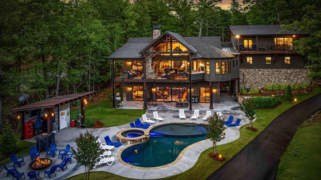 66 Rome Point Blue Ridge, GA 30513 - Photo 48 of 59 a view of a house with backyard water fountain and sitting area