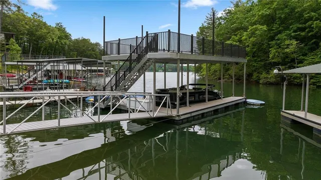a view of house with swimming pool and outdoor space
