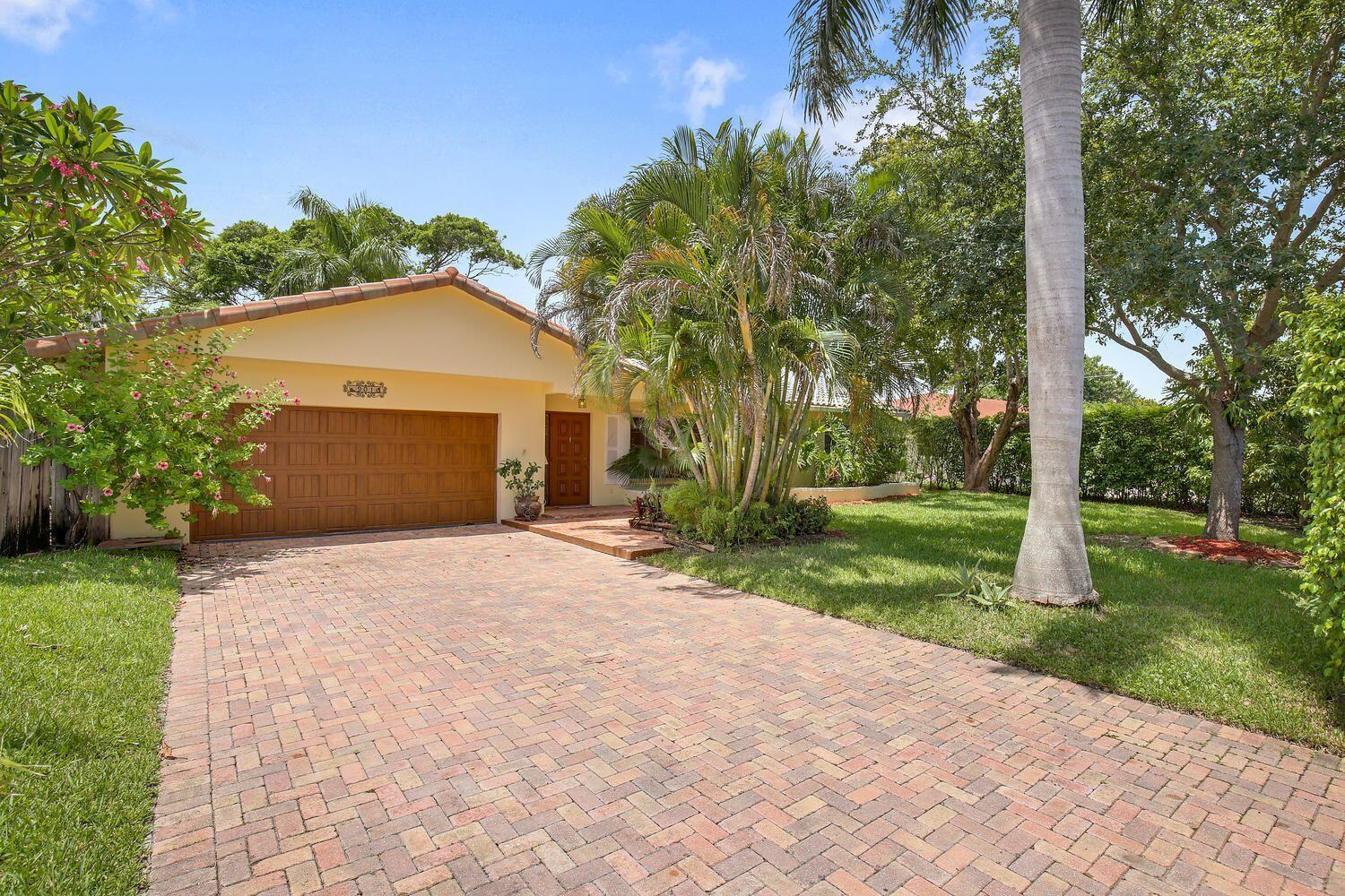 901 Northwest 5th Avenue Boca Raton, FL 33432 - Photo 1 of 4 Front View with Pavered Driveway
