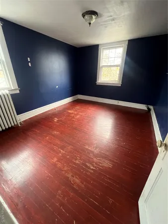 an empty room with windows