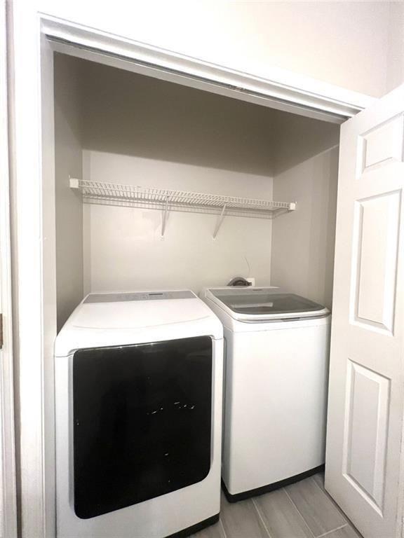3854 Austin Park Lane Decatur, GA 30032 - Photo 17 of 44 a utility room with dryer and washer