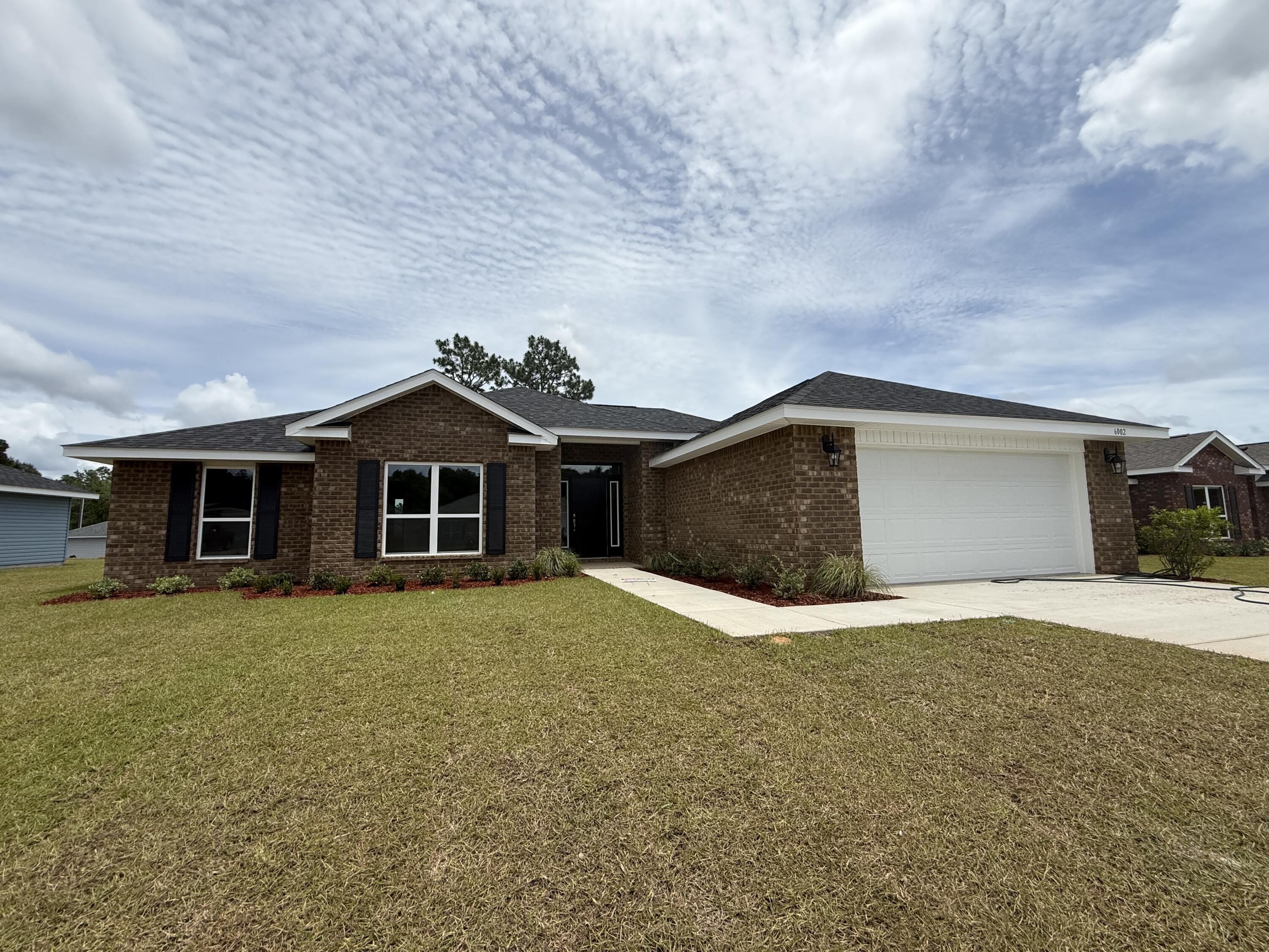 6002 Crocket Cove Crestview, FL 32539 - Photo 1 of 29 a house that has a big yard