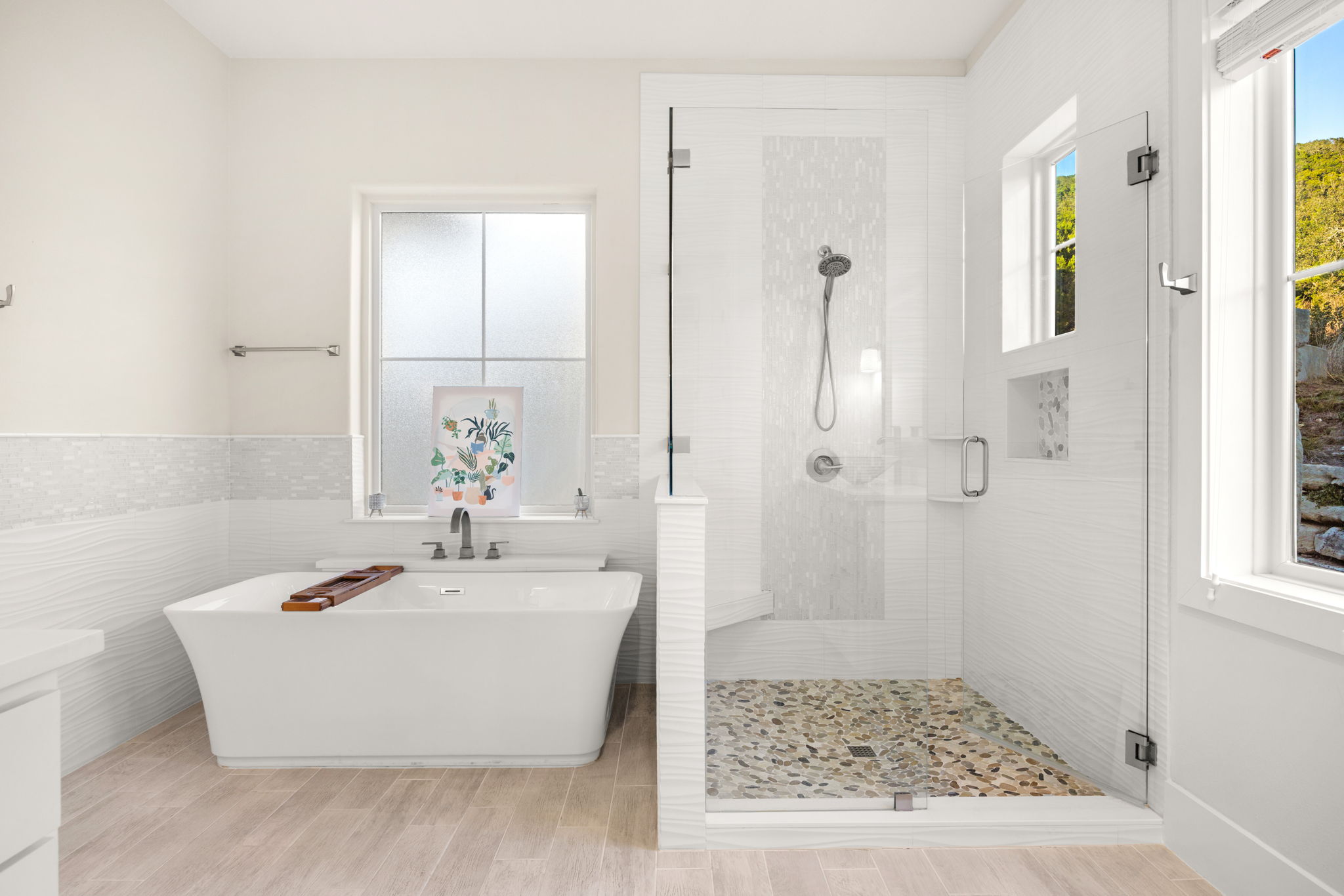 7809 Brandy Way Volente, TX 78641 - Photo 16 of 40 a bathroom with a bathtub and shower