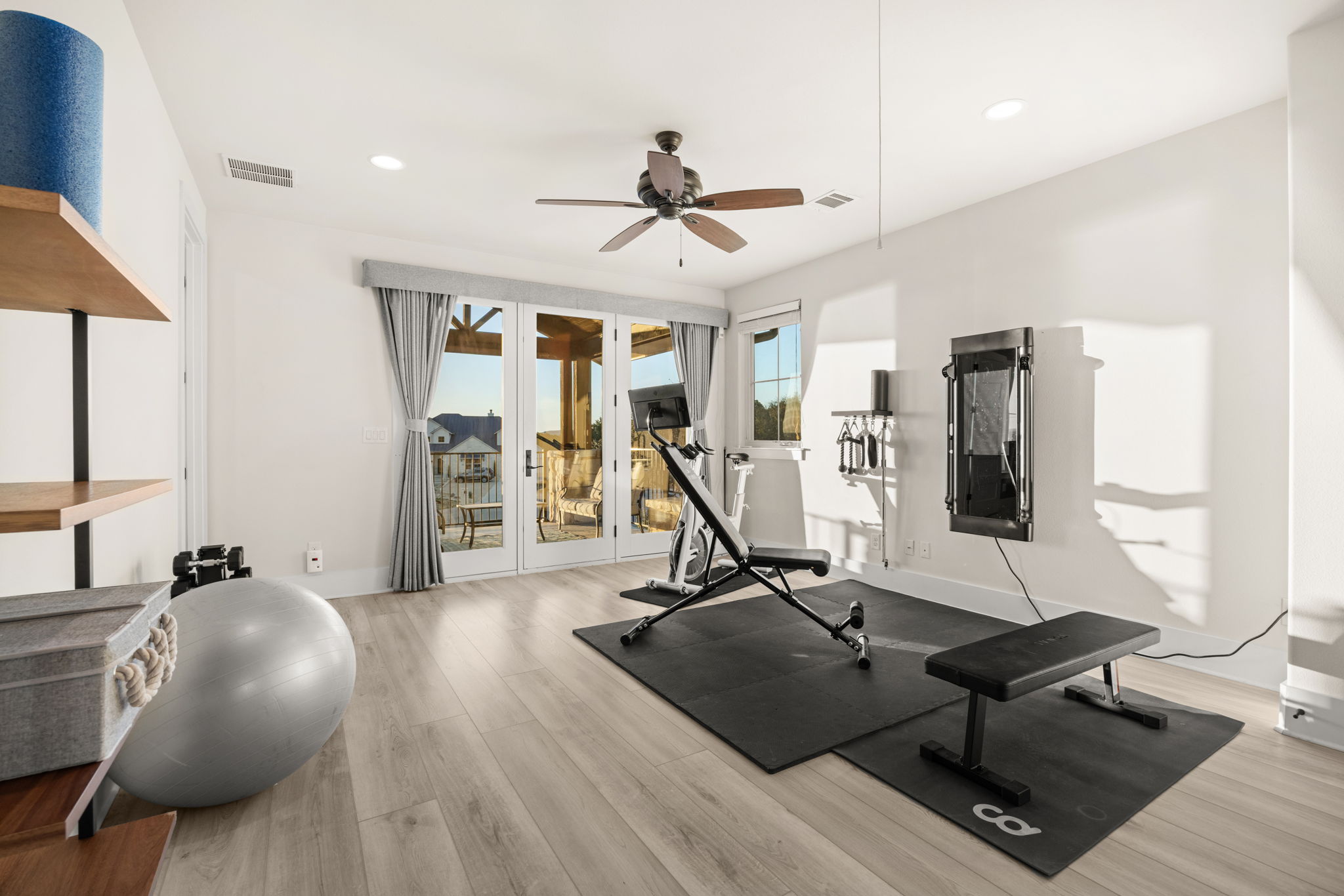 7809 Brandy Way Volente, TX 78641 - Photo 21 of 40 a view of a room with gym equipment