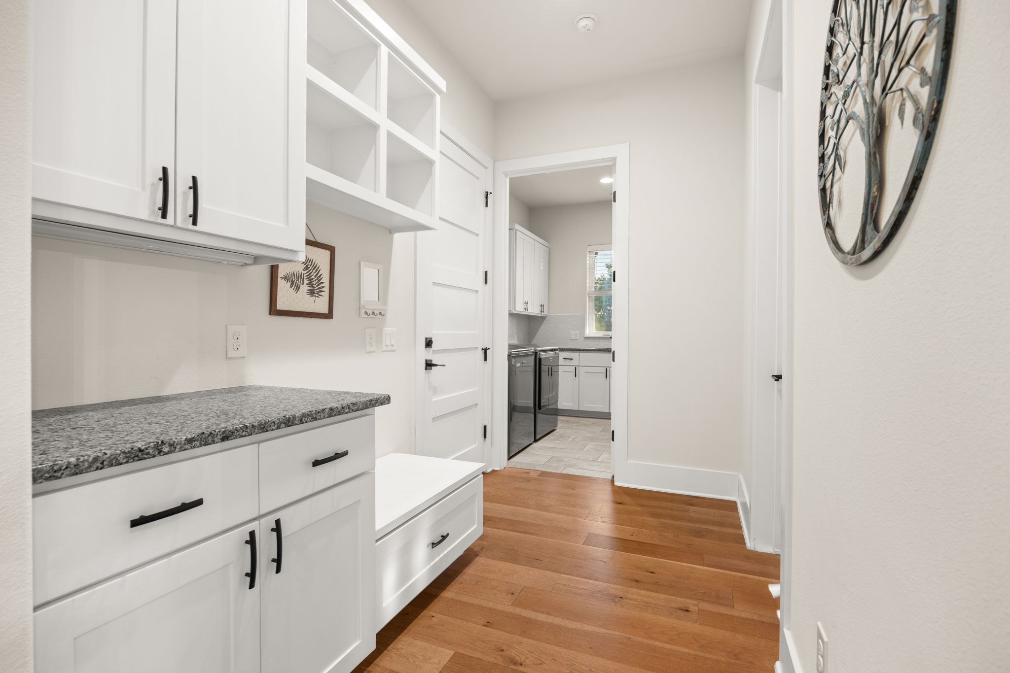 7809 Brandy Way Volente, TX 78641 - Photo 28 of 40 a kitchen with stainless steel appliances granite countertop a refrigerator and a sink
