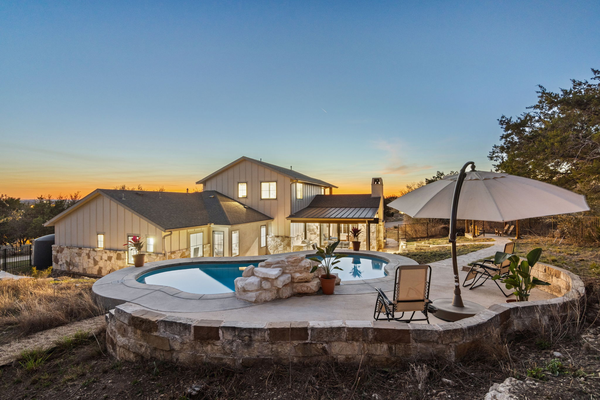 7809 Brandy Way Volente, TX 78641 - Photo 33 of 40 a view of a house with entertaining space